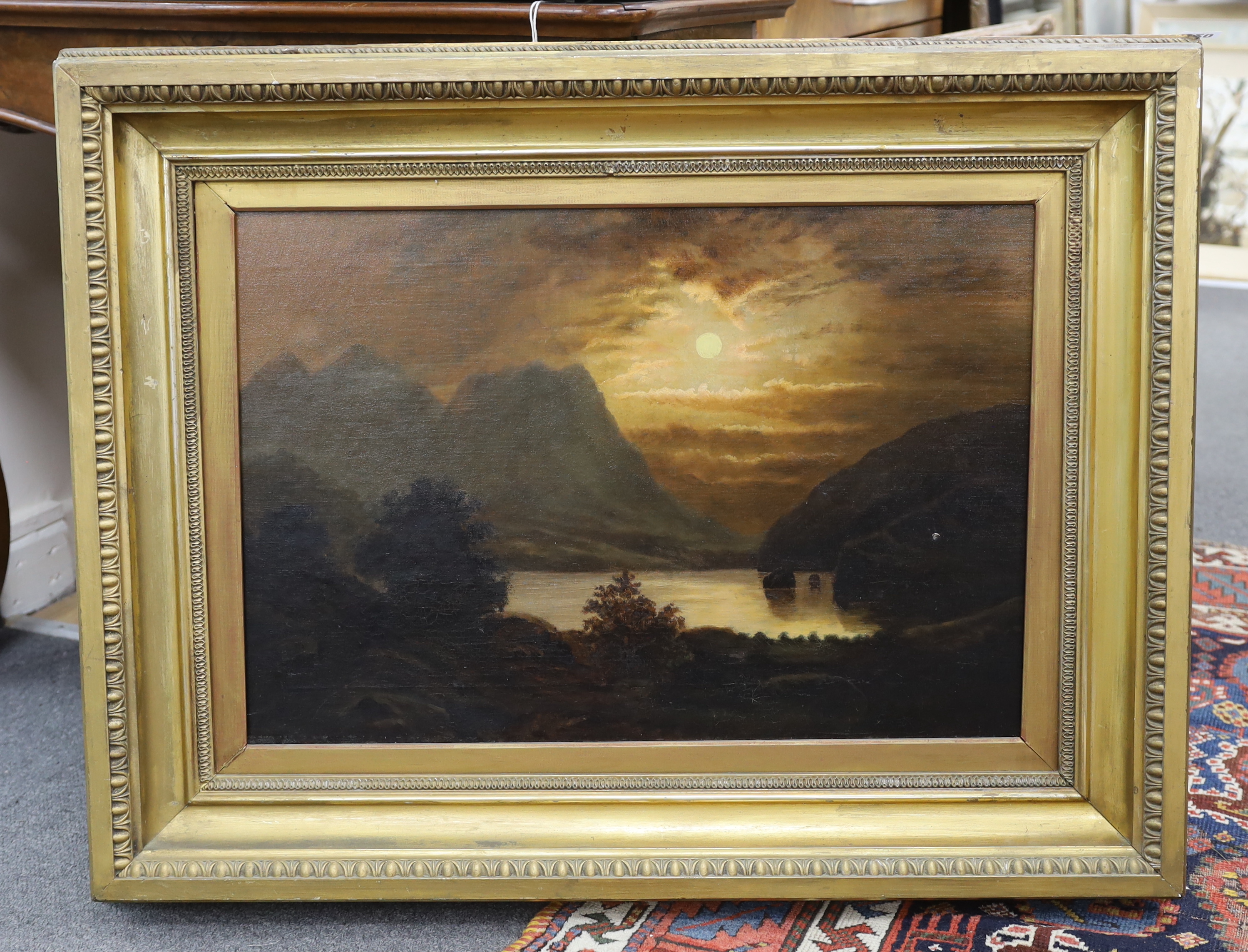 Victorian School, oil on canvas, Moonlit lakeside landscape, unsigned, 42 x 62cm, ornate gilt framed